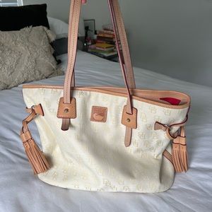 Cream Dooney! Small stain, pictured, used once. Dust bag included.